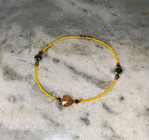 Canary anklet