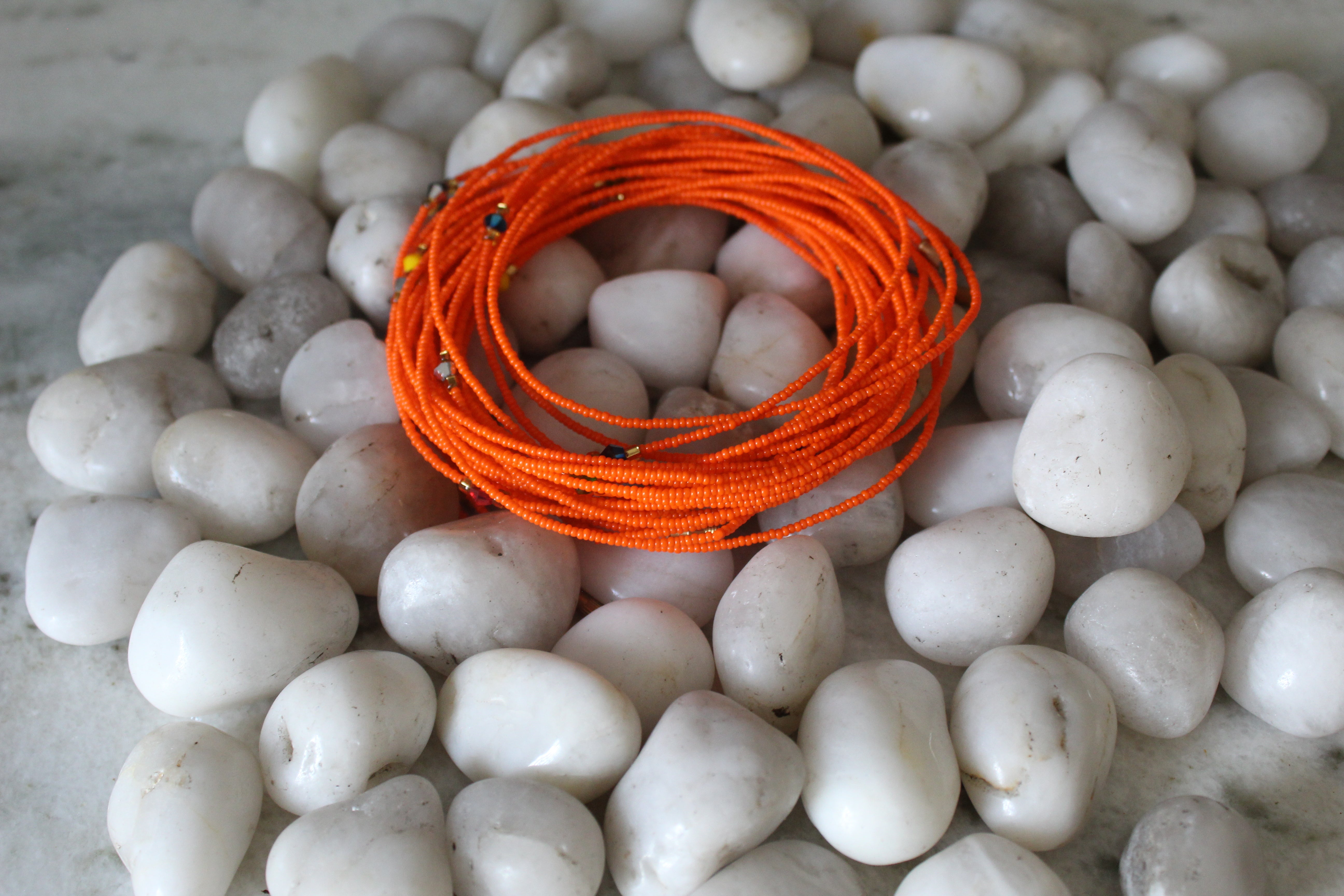 Orange sunset waist beads