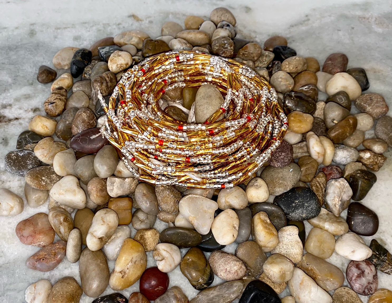 Traditional gold waist beads